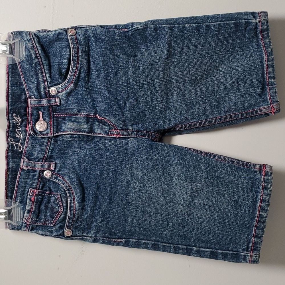 Levi's Size 6 levi shorts with pink detail & embroidered butterfly back pockets